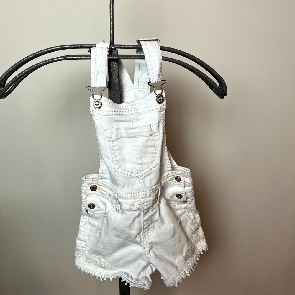Jordache white denim with lace design on the side overalls shorts size 6